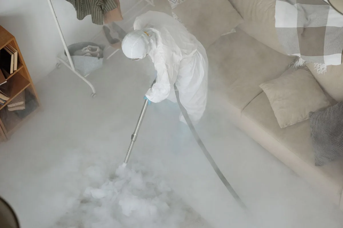 Biohazard cleanup technician in protective equipment, Venice, Los Angeles, CA